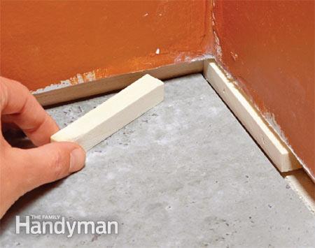 shim strips to keep baseboard plumb